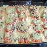 Gratin aux aubergines et aux tomates au fromage