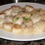Saint-Jacques au Champagne sur fondue de poireau
