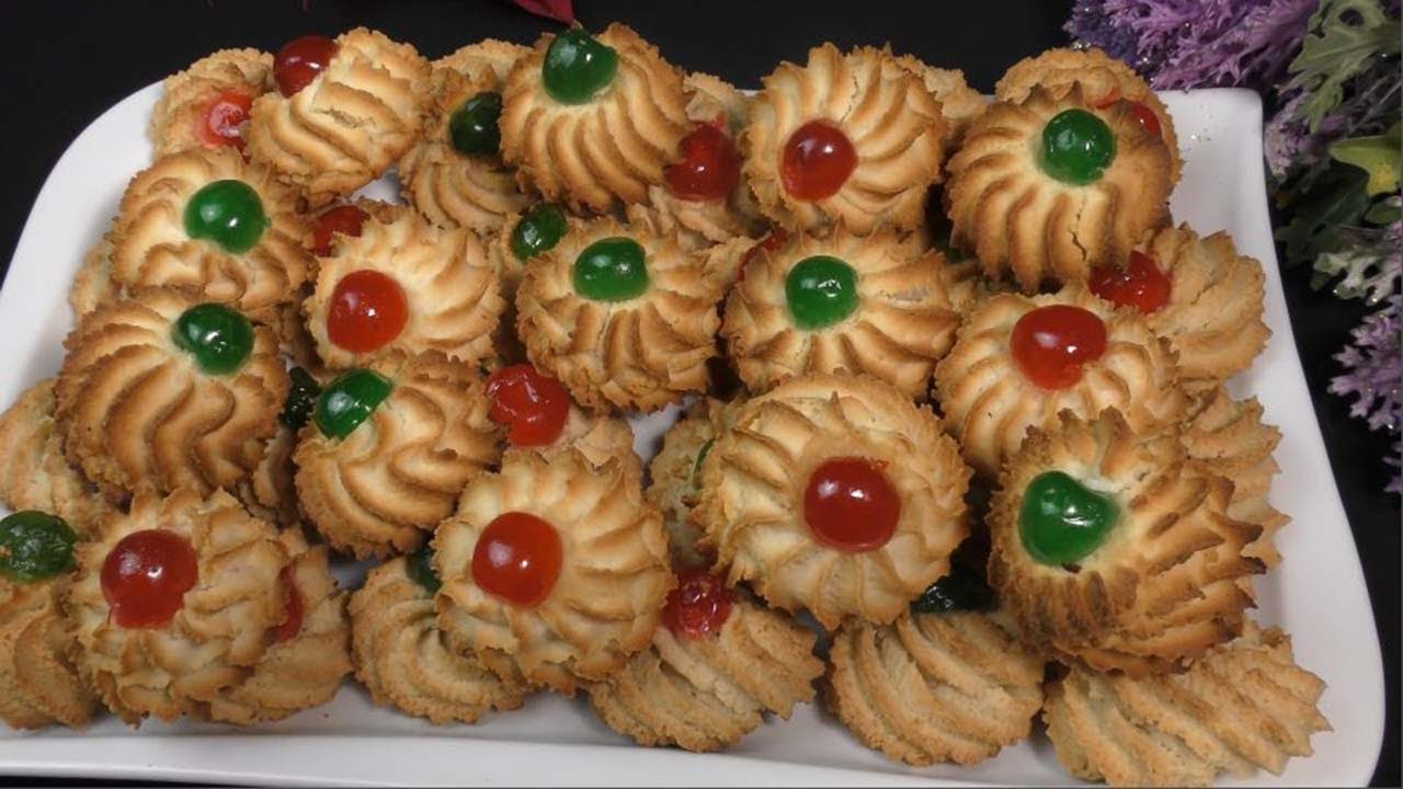 Sablés de noël d’amandes au cerises confites